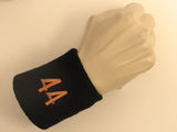 Black wristband sweatband with number 44