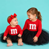 M&M print baby onesie styled look