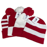 Four red and white knit beanies in striped and solid styles