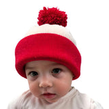 Kids white beanie with red cuff and red pom-pom