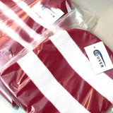 Pair of red and white striped beanies in clear packaging