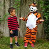 Two kids in matching striped shirt and tiger costume