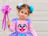 Pink fairy costume tee styled with a tutu skirt, shoulder tulle and wand