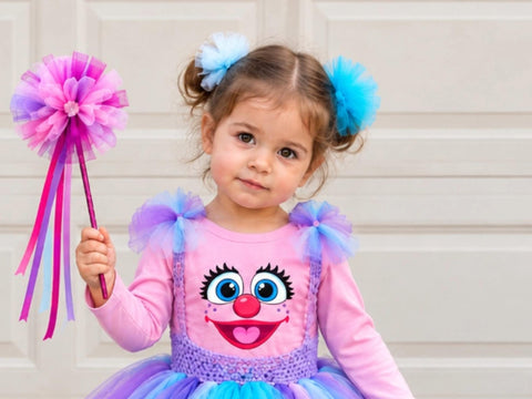 Pink fairy costume tee styled with a tutu skirt, shoulder tulle and wand