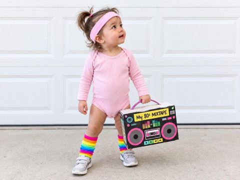 Pink toddler 80s workout costume set with bodysuit, headband and rainbow socks