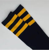 Black knee-high socks with yellow striped cuff