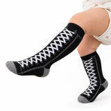Black knee-high socks with white lace-up boot print