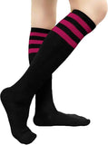 Black knee-high socks with bright magenta striped cuff
