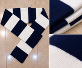 Navy and white striped pom pom beanie and knit scarf set